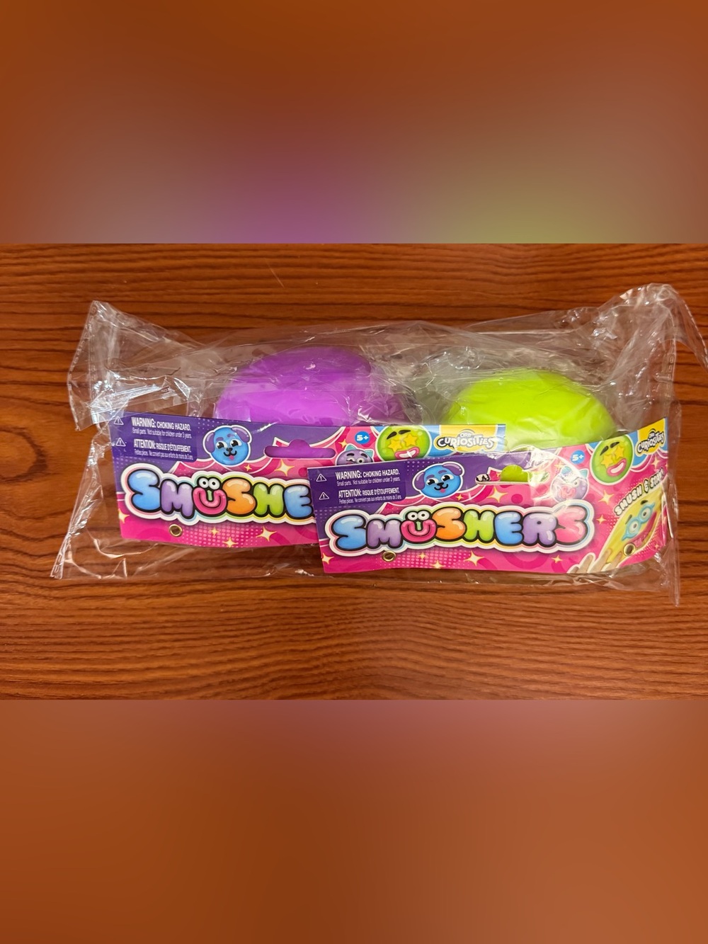 ORB Curiosity Smushers – Set of 2 Face Squishy Fidget Toy Purple Green